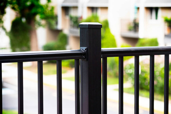 close up view on ornate iron fence of balcony style