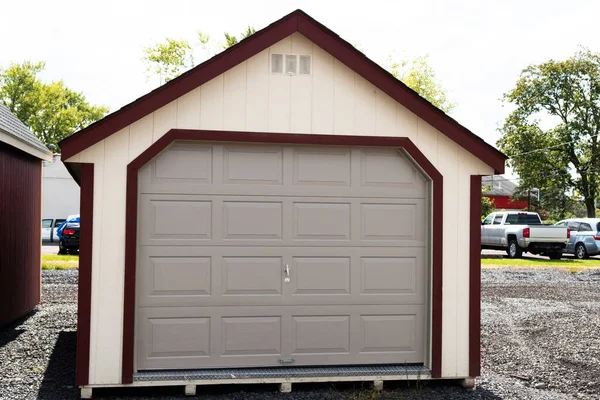 white new detached garage door fasade empty