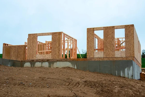 A new home under construction frame wood 2x4 rooms start real