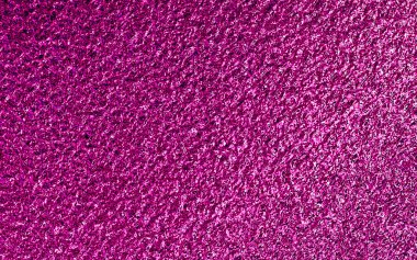 Pembe metalik folyo kağıt dokusu arkaplanı.