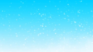 Mavi gökyüzü arka planlı Noel kar taneleri.