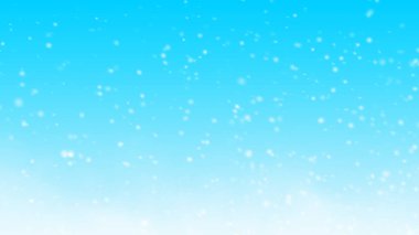 Mavi gökyüzü arka planlı Noel kar taneleri.