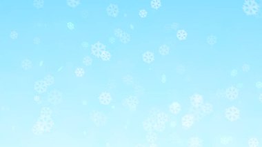 Mavi gökyüzü arka planlı Noel kar taneleri.