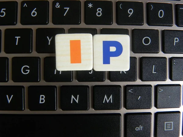 Abbreviation IP (Internet Protocol) on keyboard background