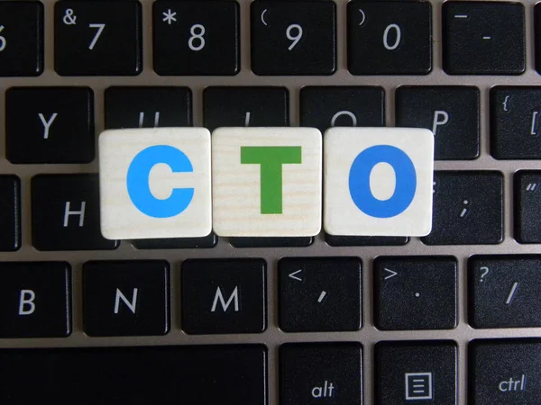 Abbreviation CTO (Chief Technology Officer) on keyboard background