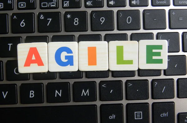 Word Agile on keyboard background