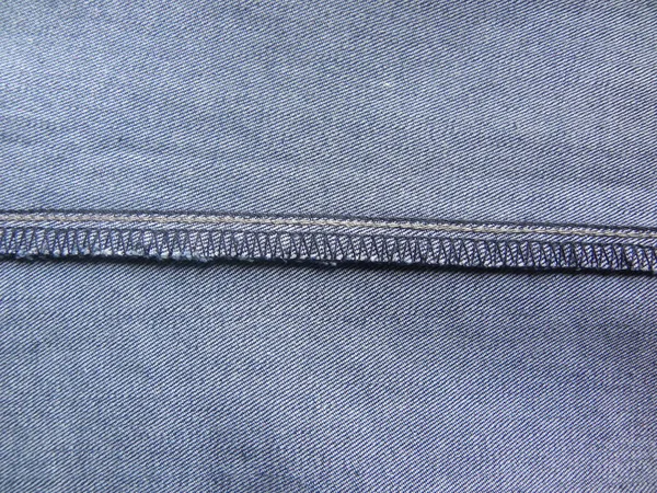 Overlocking Stitch Light Blue Color Jeans — Stok Foto