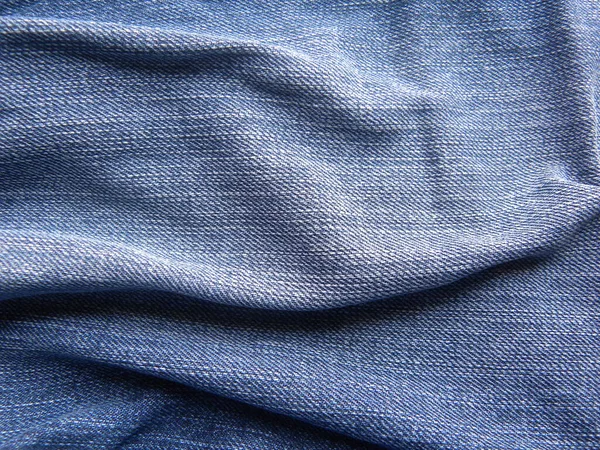 Jeans Warna Biru Dengan Latar Belakang Keriput — Stok Foto