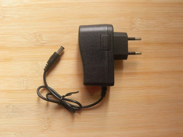 Black Color Pin Power Plug Adapter Kept Wooden Table — Stock Photo, Image