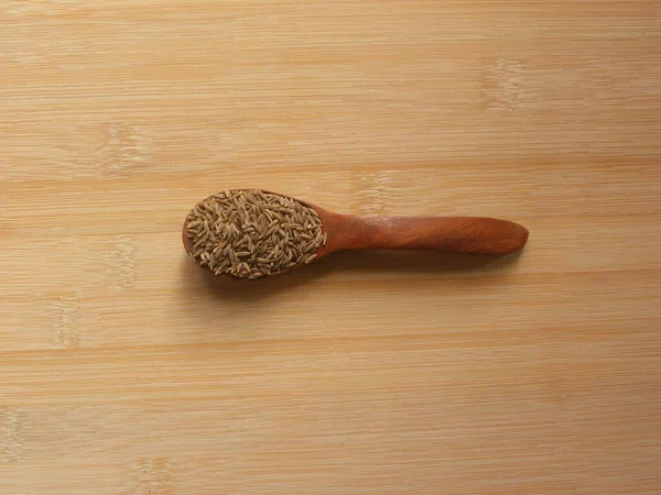 Brown Color Cumin Seeds Wooden Spoon — Stock Photo, Image