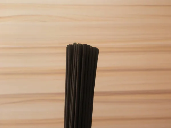 Many Black Color Thin Wooden Incense Sticks — Stock Photo, Image