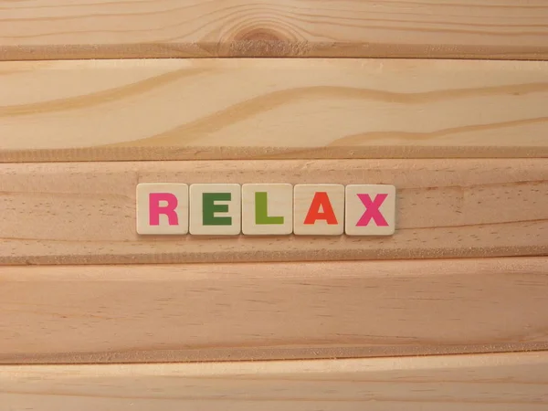 Slovo Relax Pozadí Dřeva — Stock fotografie