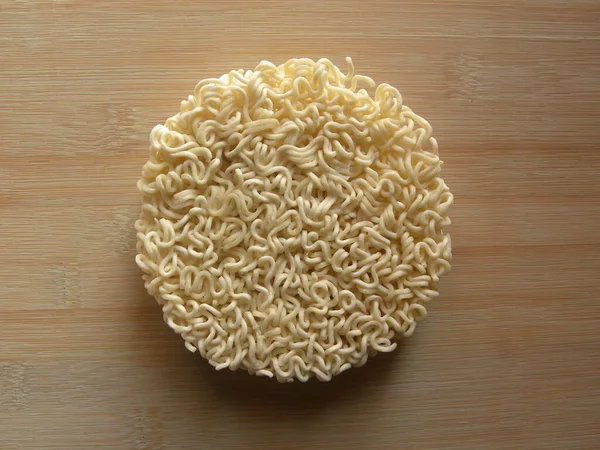 Yellowish white color raw dried Instant noodles in round shape