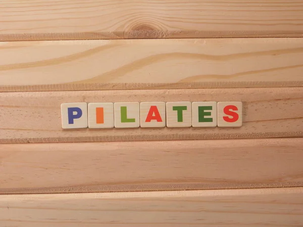 Pilates Word Pozadí Dřeva — Stock fotografie