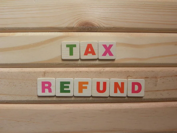 Word Tax Reembolso Sobre Fondo Madera —  Fotos de Stock