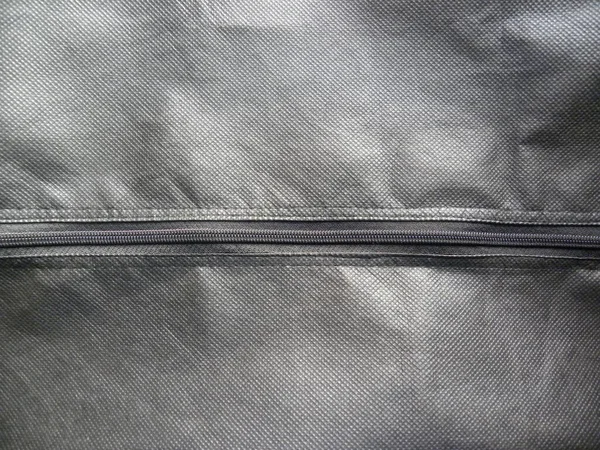 Geschlossener Reißverschluss Auf Grauer Ledertasche — Stockfoto