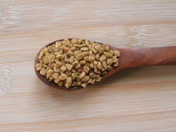 Yellow Dry Fenugreek Seeds Wooden Spoon — Stock Photo, Image