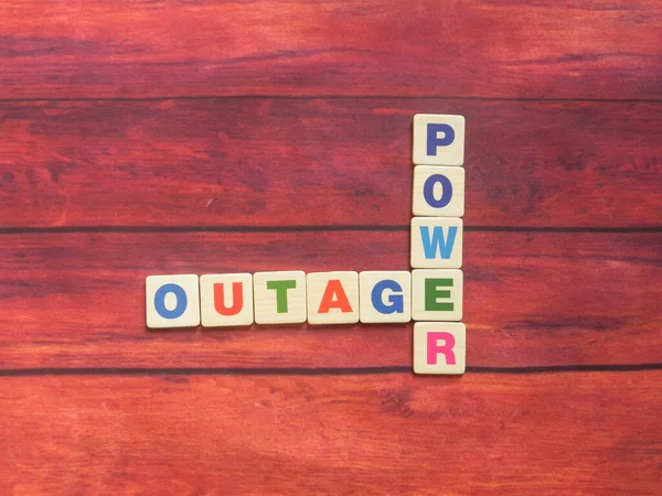 Word Power Outage Arranged Wood Background — Stock Photo, Image