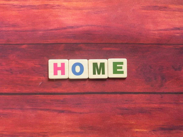 Word Home Auf Holz Hintergrund — Stockfoto