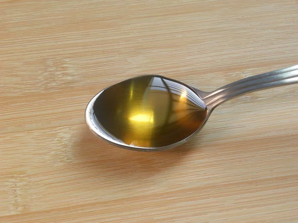 Χρυσό Κίτρινο Χρώμα Μέλι Ανοξείδωτο Ατσάλι Κουτάλι — Φωτογραφία Αρχείου