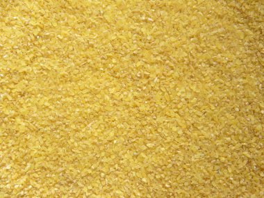 Sarı renk çiğ buğday ya da Dalia taneleri