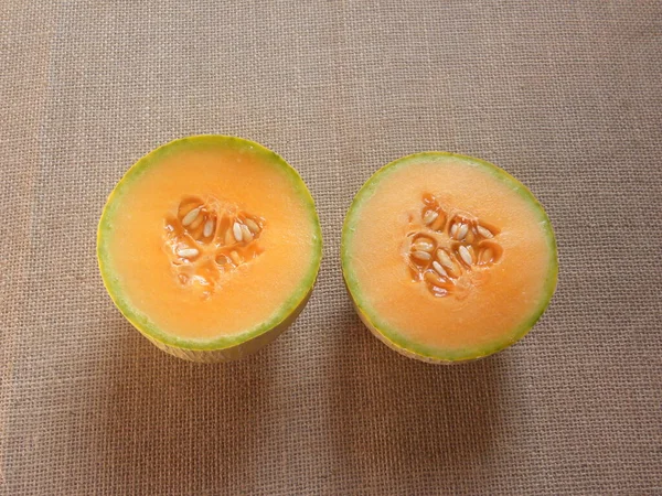 Orange color cut ripe Netted Muskmelon