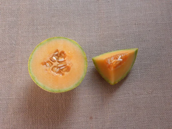 Orange color cut ripe Netted Muskmelon