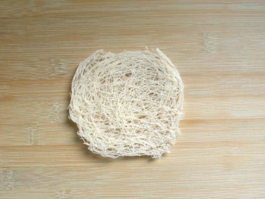 White color round raw dried string hopper rice noodles clipart