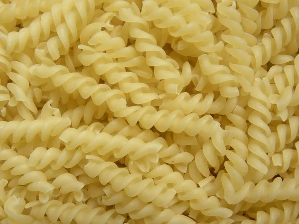 Yellow Color Raw Dry Spiral Pasta — Stock Photo, Image