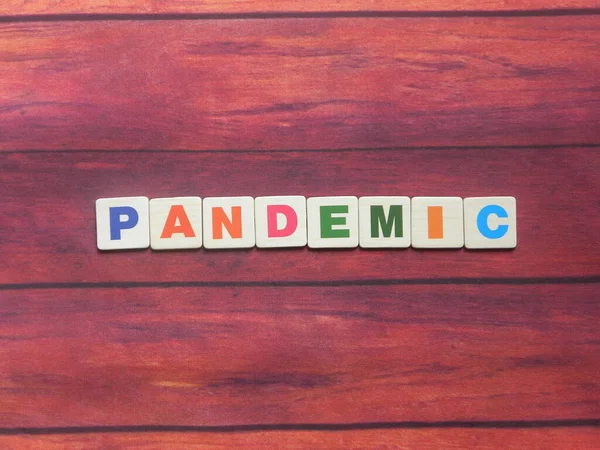 Word Pandemie Auf Holz Hintergrund — Stockfoto