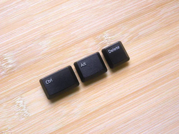 Black color Ctrl Alt Delete keys of computer keyboard