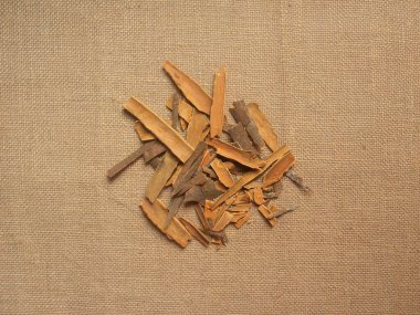 Raw whole dried Cassia bark clipart