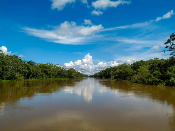 Amazon River and clouds reflex