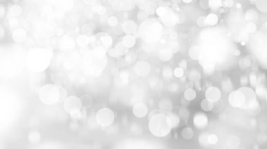 Beyaz bulanık arkaplan. Bokeh Noel 'i güzel, parlak Noel ışıklarını bulanıklaştırdı