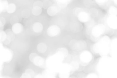 Beyaz bulanık arkaplan. Bokeh Noel 'i güzel, parlak Noel ışıklarını bulanıklaştırdı