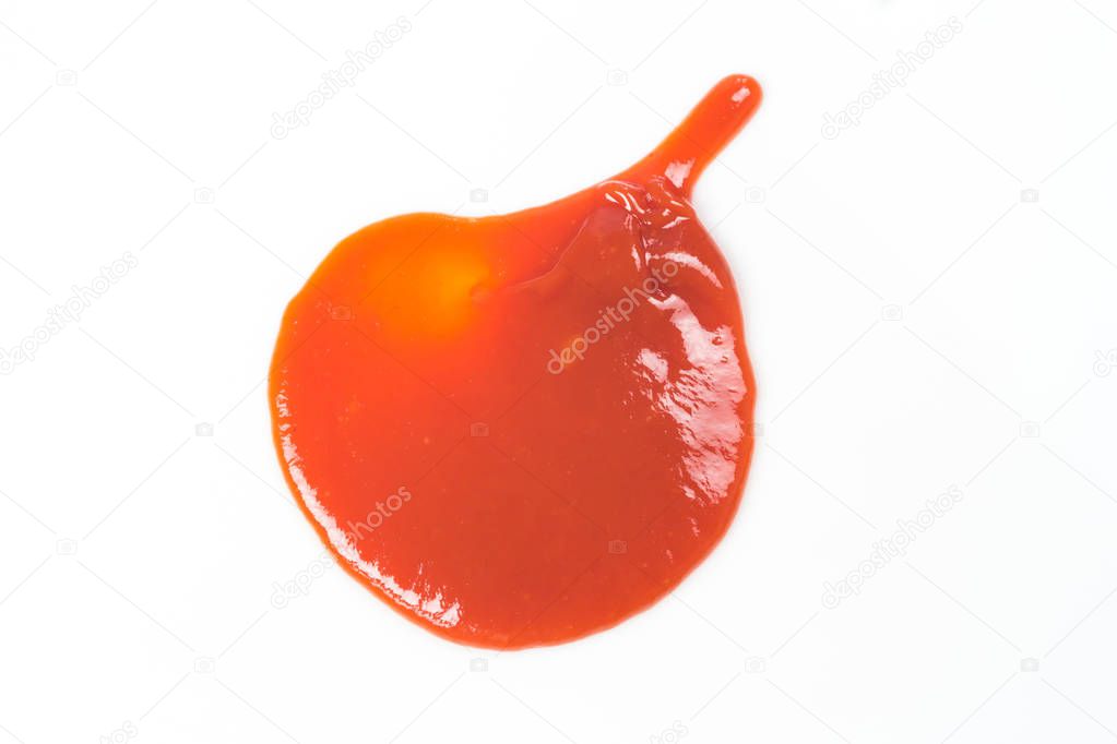 Tomato sauce isolated on white background. Red ketchup splashes isolated on white background, top view