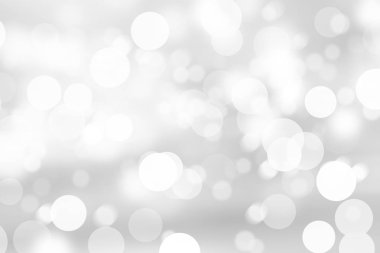 Beyaz bulanık arkaplan. Bokeh Noel 'i güzel, parlak Noel ışıklarını bulanıklaştırdı