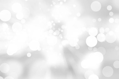 Beyaz bulanık arkaplan. Bokeh Noel 'i güzel, parlak Noel ışıklarını bulanıklaştırdı
