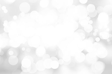 Beyaz bulanık arkaplan. Bokeh Noel 'i güzel, parlak Noel ışıklarını bulanıklaştırdı