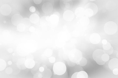 Beyaz bulanık arkaplan. Bokeh Noel 'i güzel, parlak Noel ışıklarını bulanıklaştırdı