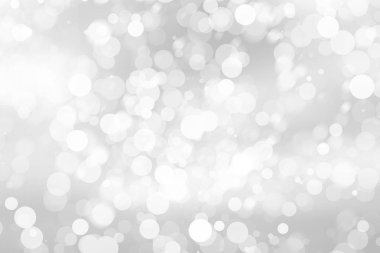 Beyaz bulanık arkaplan. Bokeh Noel 'i güzel, parlak Noel ışıklarını bulanıklaştırdı