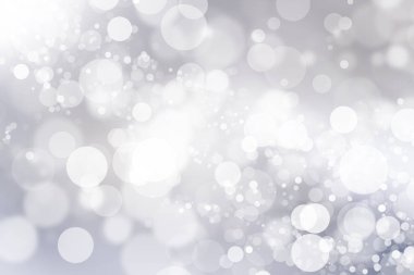 Beyaz bulanık arkaplan. Bokeh Noel 'i güzel, parlak Noel ışıklarını bulanıklaştırdı