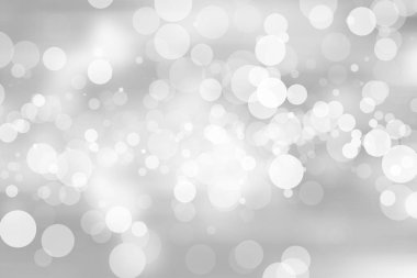 Beyaz bulanık arkaplan. Bokeh Noel 'i güzel, parlak Noel ışıklarını bulanıklaştırdı