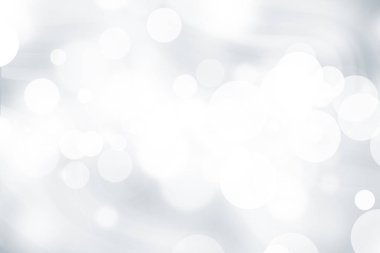 Beyaz bulanık arkaplan. Bokeh Noel 'i güzel, parlak Noel ışıklarını bulanıklaştırdı