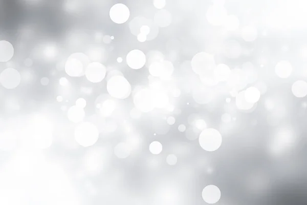 Beyaz bulanık arkaplan. Bokeh Noel 'i güzel, parlak Noel ışıklarını bulanıklaştırdı