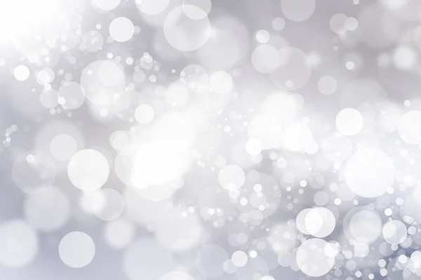 Beyaz bulanık arkaplan. Bokeh Noel 'i güzel, parlak Noel ışıklarını bulanıklaştırdı