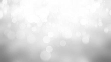 Beyaz bulanık arkaplan. Bokeh Noel 'i güzel, parlak Noel ışıklarını bulanıklaştırdı