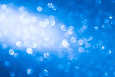 mavi arka plan görüntü. güzel parlak Noel ışıkları bokeh Noel bulanık.