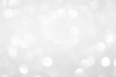 Beyaz bulanık arkaplan. Bokeh Noel 'i güzel, parlak Noel ışıklarını bulanıklaştırdı