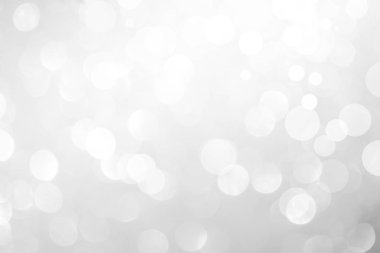 Beyaz bulanık arkaplan. Bokeh Noel 'i güzel, parlak Noel ışıklarını bulanıklaştırdı